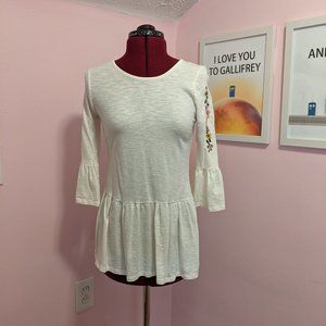 Peplum blouse with embroidery